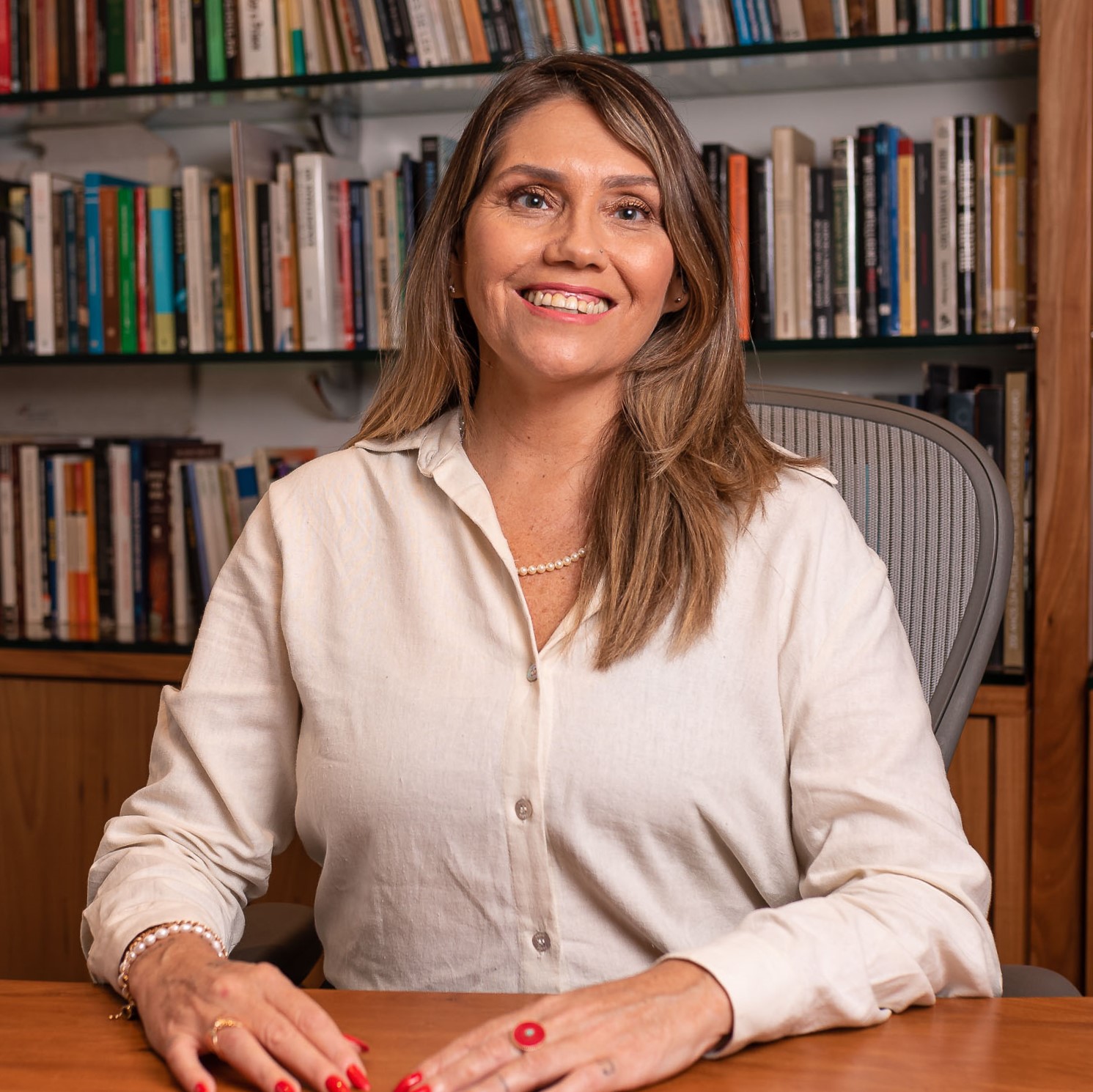 CLÁUDIA HERKENHOFF